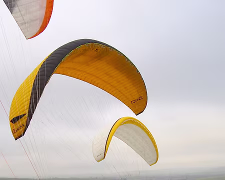 06 ou pour jouer voile au dessus de la tête en haut de la pente