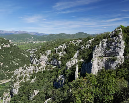P1180576 Vue sur Ganges et les Cévennes : l'Oiselette (722m), Serre de la Toureille (1253m), Mont Aigoual (1565m) et Ranc de Banes (713m).