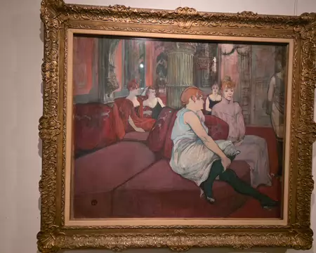 064 Au salon de la rue des Moulins, huile réalisée par Toulouse-Lautrec (1864 – 1901) en 1894.